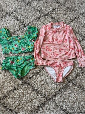 Carter's Pink Flamingo and Cat & Jack floral bathing suits